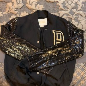 varsity jacket with gold and black sequin arms